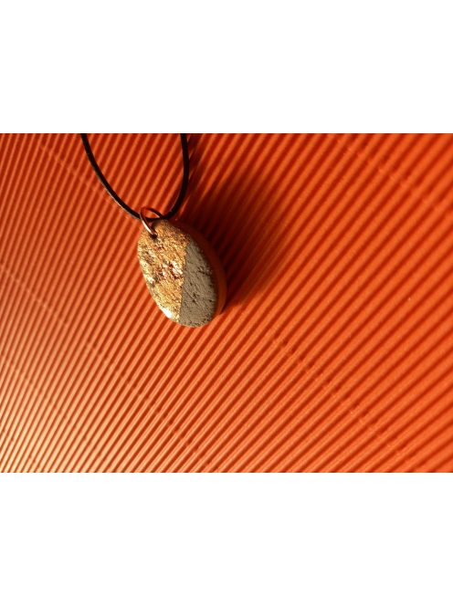 Copper colored oval concrete pendant necklace